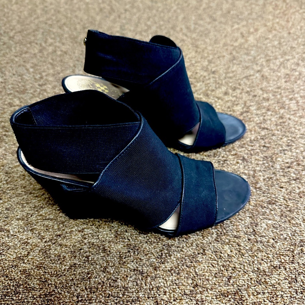 Vince Camuto black wedges size 71/2 open toe with gold hardware. Lightly worn